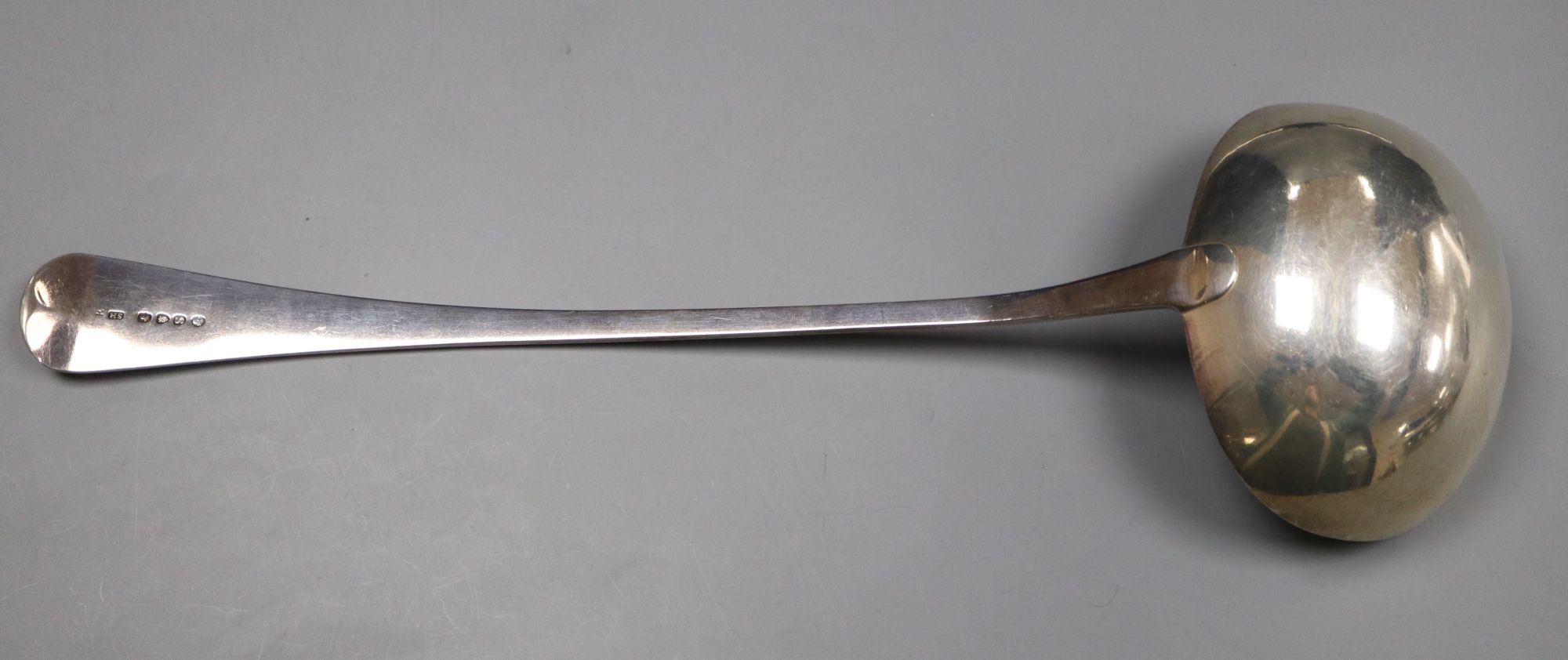 A George III silver Old English pattern soup ladle, Soloman Hougham, London, 1813, 34cm, 178 grams.